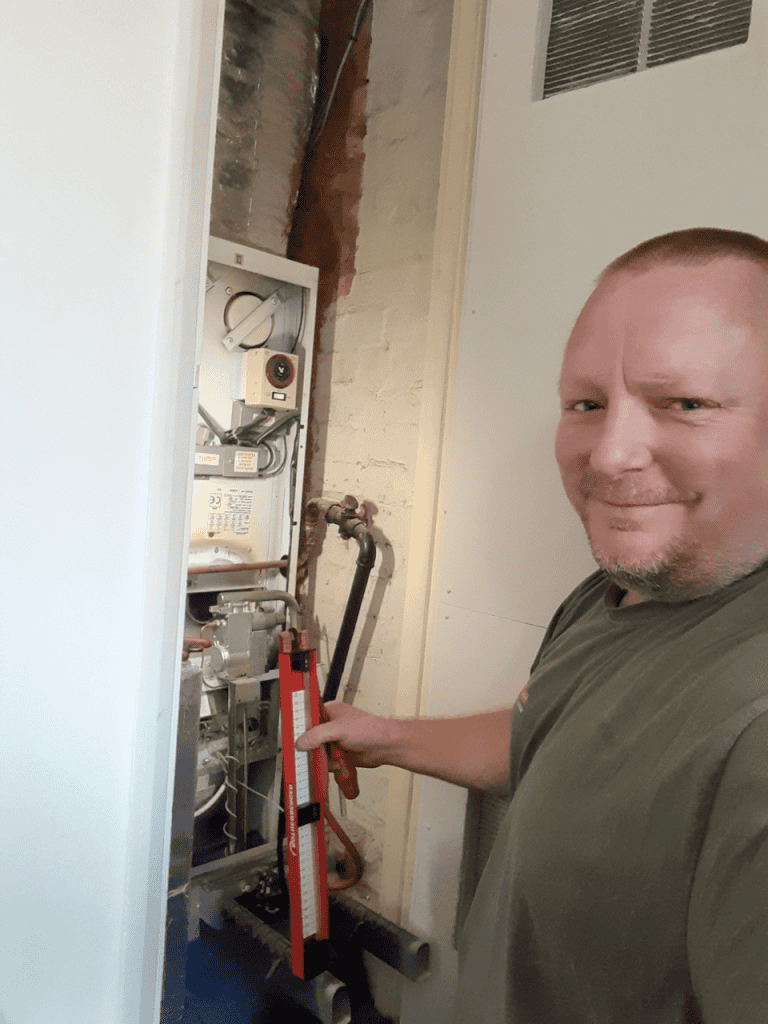Open flued warm air unit fixed, serviced and running safely